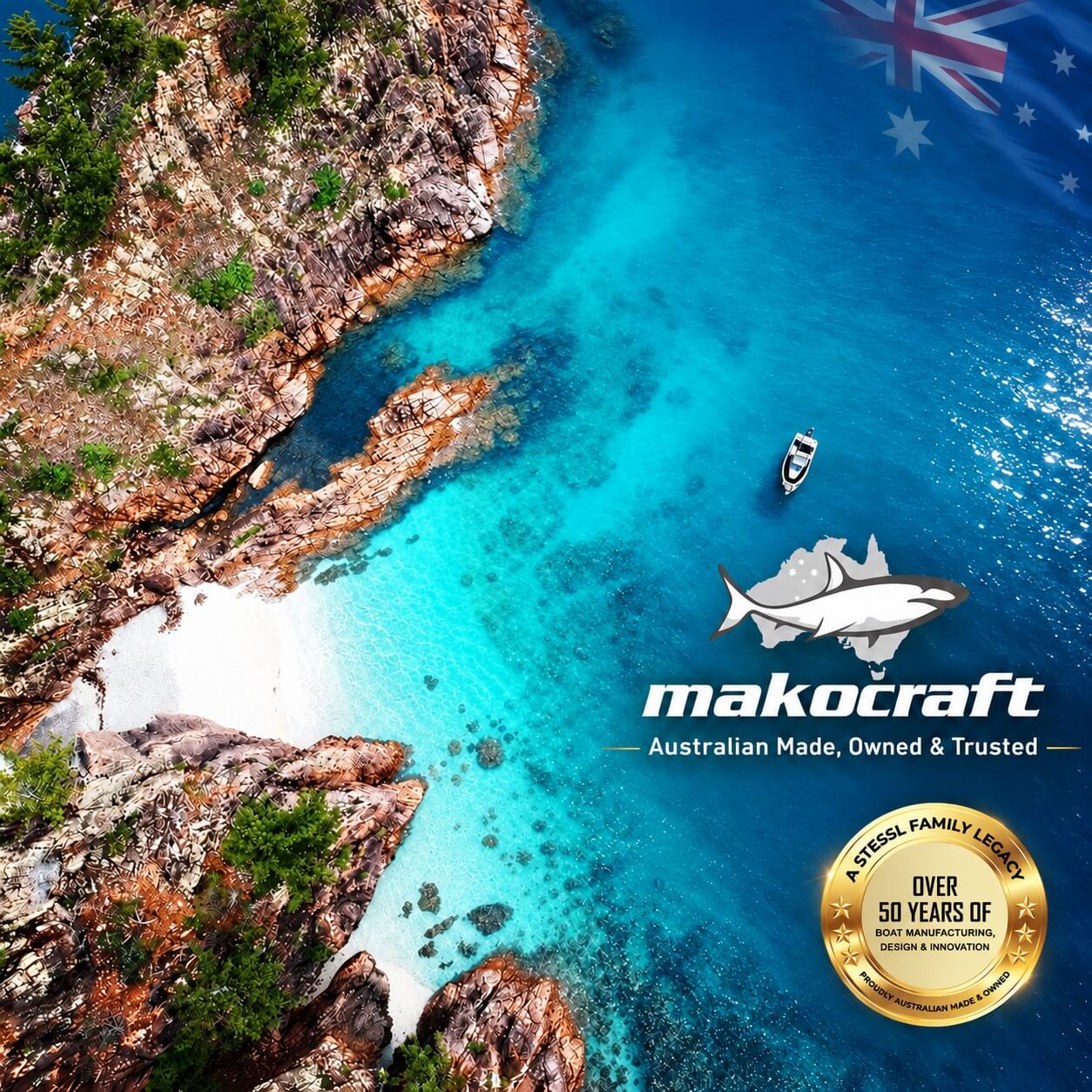 Aerial view of a Makocraft boat anchored in a clear Australian cove